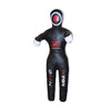 Black MMA training dummy with red eye on a dark background