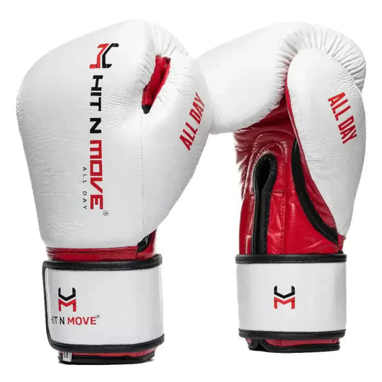 White boxing gloves with red accents and 'Hit N Move' branding on a white background