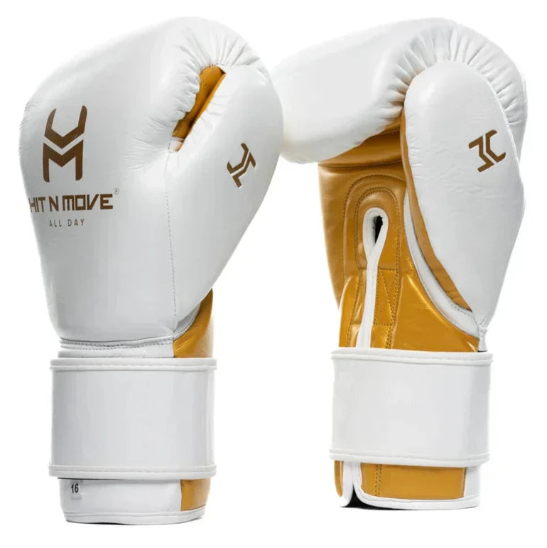 White and gold boxing gloves with branding on a white background