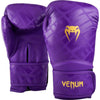 Purple boxing gloves with yellow Venum logo