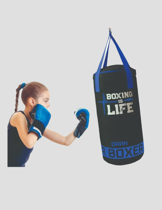 Child wearing boxing gloves interacting with a punching bag labeled 'Boxing is Life' on a white background.